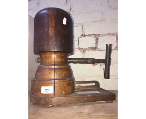 A vintage hat stretcher.Condition:- One small crack to side and one crack in base, general wear through age and use, in worki