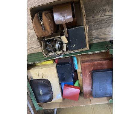 A large box containing boxes of fishing fly's and a box of 5 vintage reels