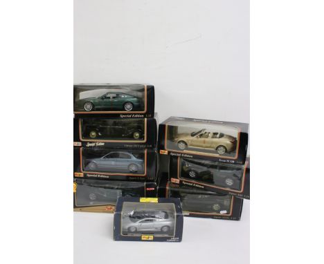 Eight boxed Maisto diecast models to include 7 x 1:18 scale models featuring Jaguar XK8, Jaguar XJ220, Jaguar S-Type, Morgan 