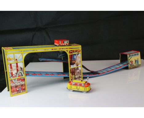 Gama (Western Germany) tin plate mine with vehicle, some play wear, gd overall condition and with key 