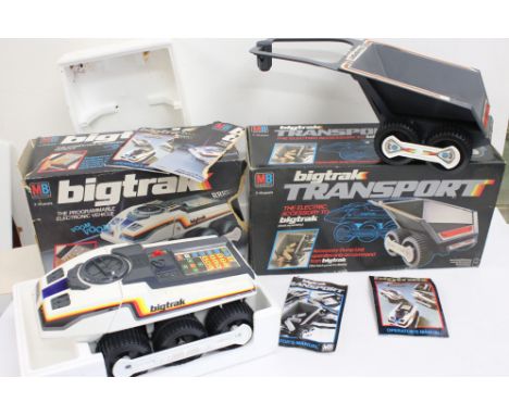 Boxed MB Electronics Bigtrak, tatty box with manual, plus boxed MB Bigtrak Transport (2) 