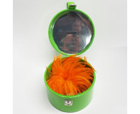 A Swatch pop watch decorated with feathers, in original box.