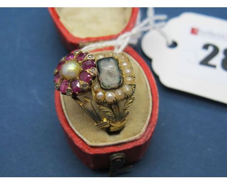 An Early XIX Century 18ct Gold Mourning Ring, with central hair work panel within pearl border, between trifurcated shoulders