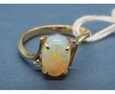 A Single Stone Opal Ring, the central oval cabochon four claw set, between crossover shoulders with claw set highlights, stam