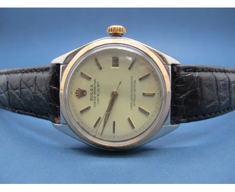 Rolex; An Oyster Perpetual DateJust Bubble Back Gent's Wristwatch, Ref:5031, (serial number unclear) the signed dial with bat