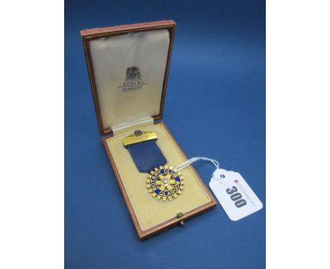 Rotary Club Glasgow; A Medallion Pendant, highlighted in blue enamel, circular collet set to the centre, stamped "15ct", susp