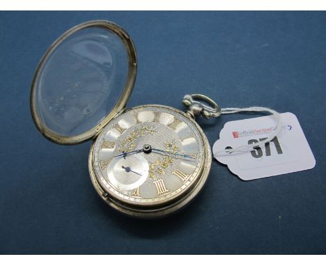 A Hallmarked Silver Cased Openface Pocketwatch, the two tone engine turned dial with italic Roman numerals and seconds subsid