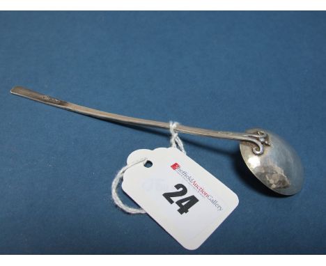 An Arts & Crafts Hallmarked Silver Spoon, Joseph & Joyce Himsworth, Sheffield 1930, with hammered bowl and scroll detail, 15.