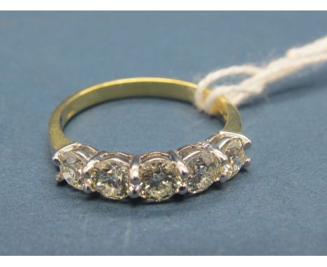 An 18ct Gold Five Stone Diamond Ring, of uniform design, claw set with brilliant cut stones. 