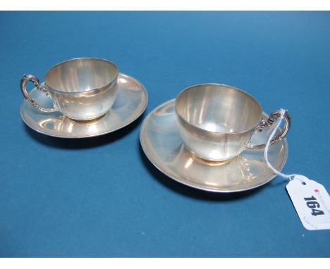 A Pair of Spanish Cups and Saucers, stamped "916" "G. Sanz". 