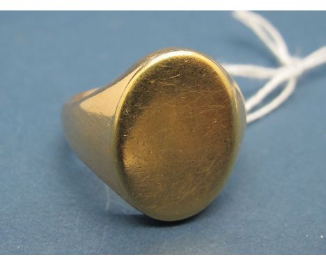 A Gent's Signet Ring, with plain oval panel, indistinctly stamped. 