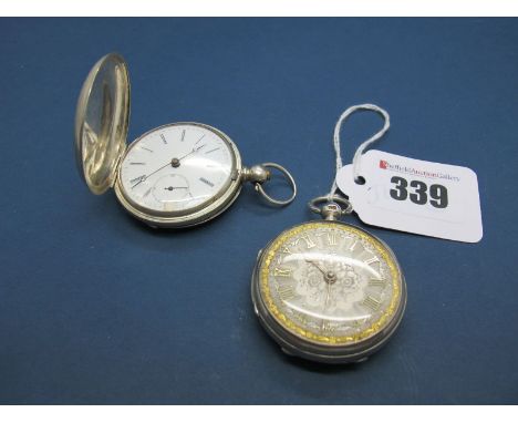 A Hallmarked Silver Cased Openface Fob Watch, the decorative dial with Roman numerals and gilt highlights, the movement unsig