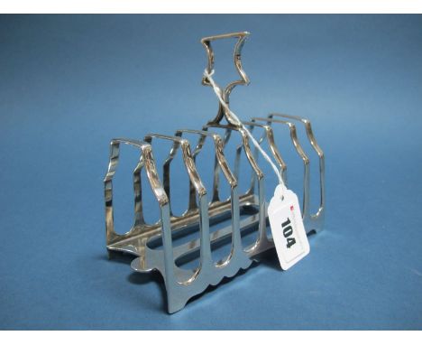 A Hallmarked Silver Seven Bar Toast Rack, JD&S, Sheffield 1911, with angular high central loop handle, 235grams. 