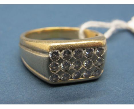 A Gent's Diamond Set Ring, rubover set to the centre with three rows of five uniform brilliant cut stones, between two colour