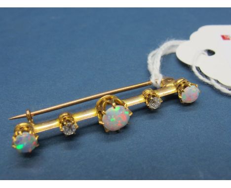 An Opal and Diamond Set Bar Brooch, of graduated design, circular claw set on knife edge bar. 