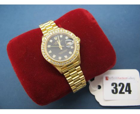 Rolex; A 1980's Oyster Perpetual (69178) Datejust Ladies Wristwatch, serial number R431944 (for 1988), the signed black dial 