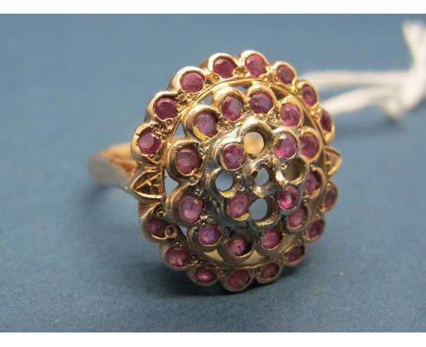 A Ruby Set Cluster Ring, of circular design (stones missing). 