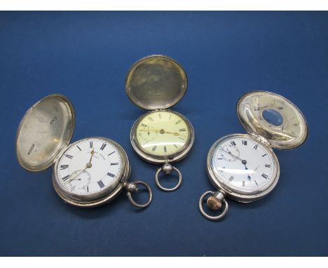 A Hallmarked Silver Cased Hunter Pocketwatch, the dial with Roman numerals and seconds subsidiary dial, the movement signed J