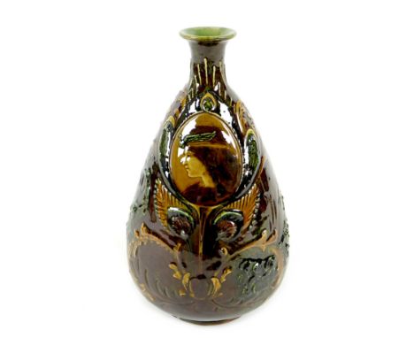 A rare Art Nouveau Doulton Burslem pottery Holbein Ware vase, circa 1900, of pear from with narrow neck and flared rim, decor