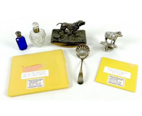 A group of collectables, comprising a cast metal figural blotter, the handle in the form of a dog, 12.5cm long, a cast white 