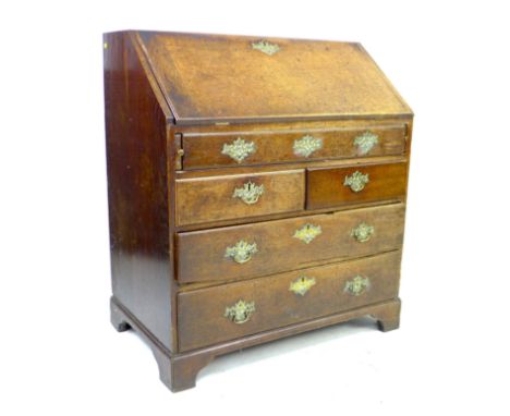 A Georgian oak bureau, a/f poor condition, fall front with fitted interior, one long over two short over two long drawers wit