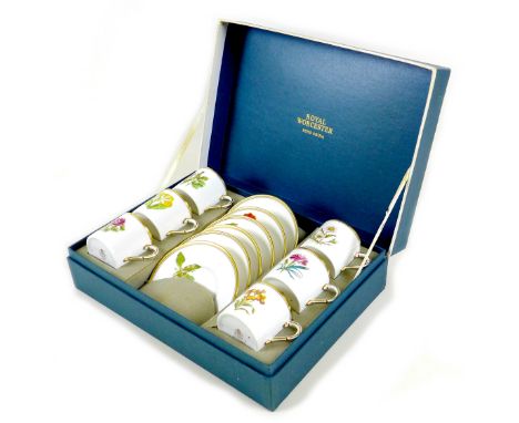 A Royal Worcester coffee service, each differently decorated with various flowers, named to bases including 'Lily of the Vall