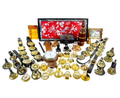 A mixed group of collectables, comprising a group of 19th century horse brasses, on leather straps, two cast metal match hold