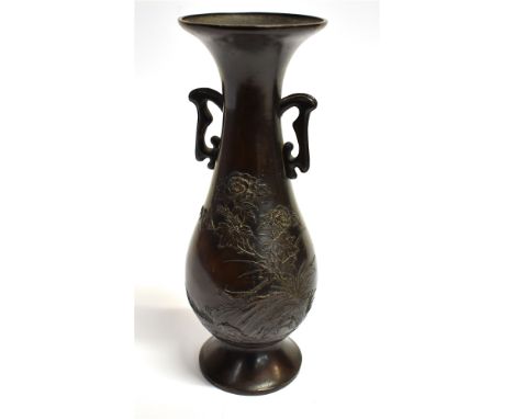 A TWO HANDLED BRONZE VASE  relief decorated with a bird and blossoming branch on a riverbank, impressed seal mark to base, 23