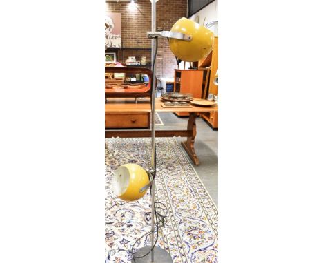A MID-CENTURY 'EYEBALL' STANDARD LAMP  with two adjustable shades, 154cm high