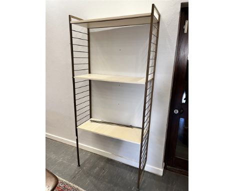 A BAY OF LADDERAX SHELVING  comprising two one legged uprights and three painted shelves, together with five further shelf ra