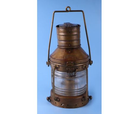 An 'Anchor' brass ship's lantern, 34cms high.