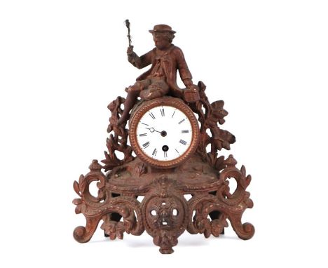 A 19th century French gilt metal figural mantle clock, the enamel dial with Roman numerals, 31cms high.Condition ReportLacks 