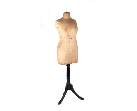 A late 19th / early 20th century dressmaker's wasp waist mannequin, the textile body on ebonised column and tripod base.