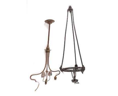 An Art Nouveau brass twin-arm ceiling light; an Edwardian gas ceiling light; together with a brass standard lamp (3).