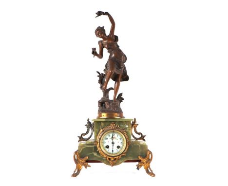 A French figural mantle clock, with enamel, green figured marble case surmounted a gilt spelter figure. 58cm high
