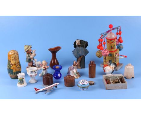A quantity of assorted collectable items to include a Beatrix Potter Hunka Munka; a Hummel group shepherd boy; marbles; a clo