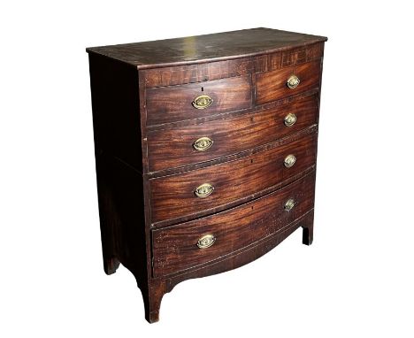 A George III mahogany bowfront chest of drawers with two short and three graduated long drawers, on bracket feet, 106cms wide