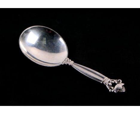 A Georg Jensen silver acorn design caddy spoon, 25g, 10cms long.