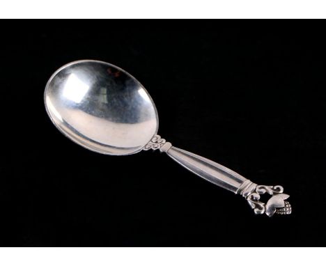 A Georg Jensen silver acorn design caddy spoon, 25g, 10cms long.