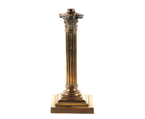 A brass Corinthian column table lamp on square stepped base, 33cms high.