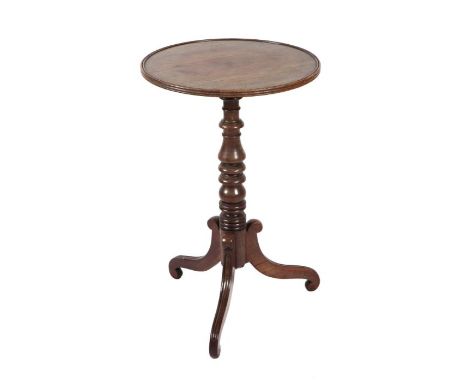 A 19th century mahogany tripod table with dished circular top, on a turned column, 46cms diameter.