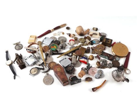 A quantity of small collectable items to include a Victorian copper snuff box in the form of a coffin; cigarette lighters; th