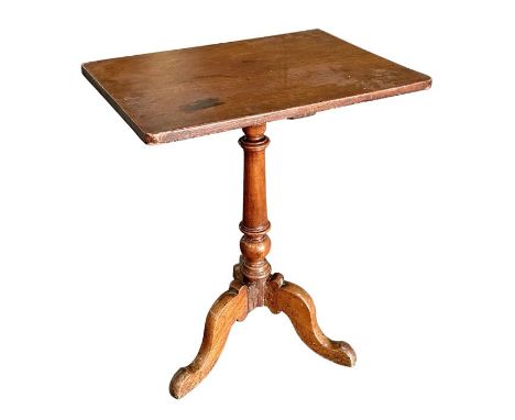 A 19th century mahogany tripod table with rectangular top, on a tapering turned column, 59cms wide.