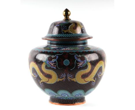 A large Chinese cloisonné vase and cover decorated with yellow dragons chasing a flaming pearl, on a black ground, 28cms high