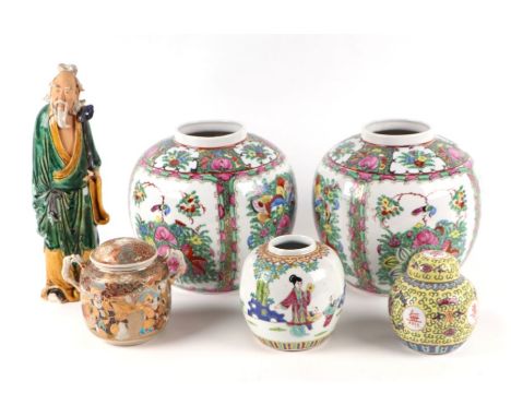 A quantity of assorted Chinese and Japanese ceramics to include a pair of Chinese famille rose vases decorated with flowers, 