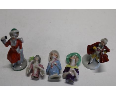 A selection of vintage porcelain pot dolls 