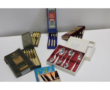 A selection of assorted boxed vintage cutlery 