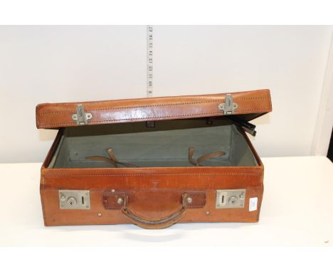 A quality vintage leather suitcase 