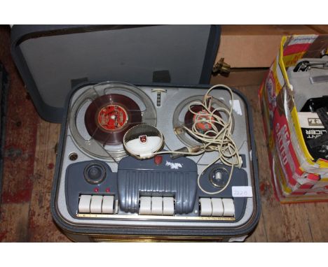 A vintage reel to reel player 