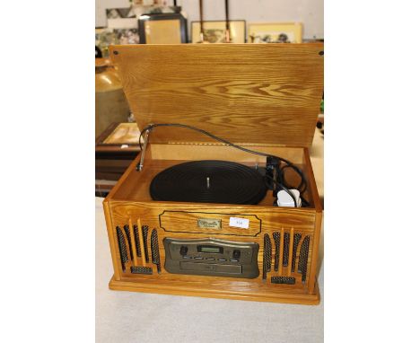 A vintage style record player with CD &amp; radio 